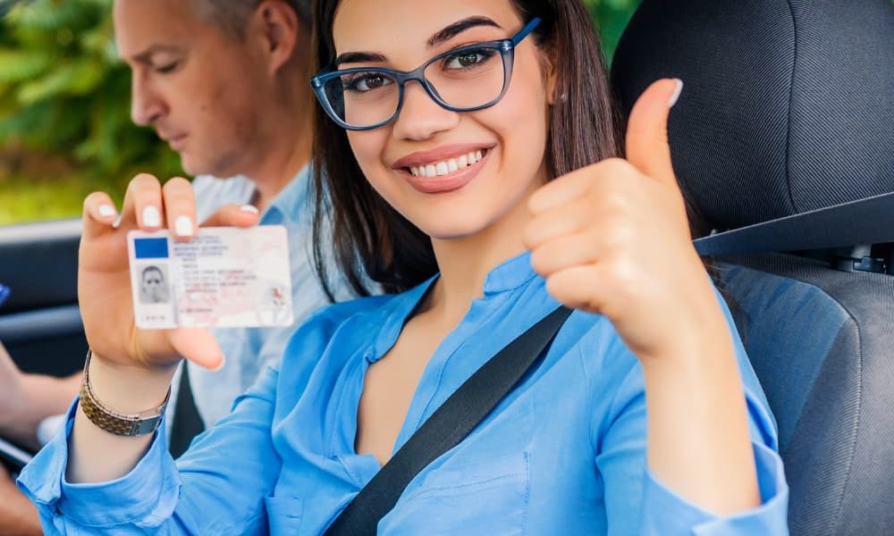 driving-school-beautiful-young-woman-successfully-passed-driving-school-test-she-looking.jpg